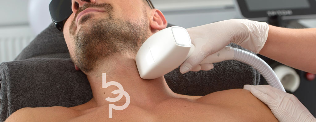 Man getting laser hair removal on neck.